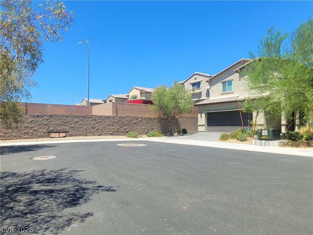 7618 Red Plumeria Avenue