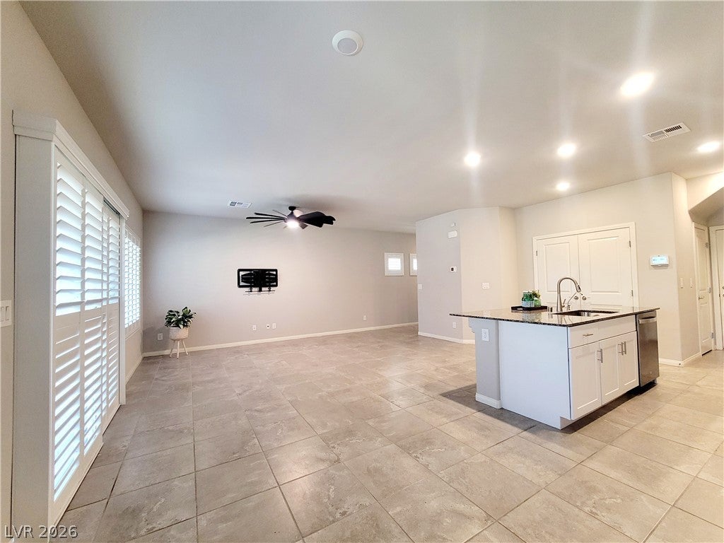 7618 Red Plumeria Avenue
