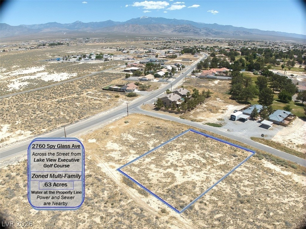This expansive vacant lot offers prime development