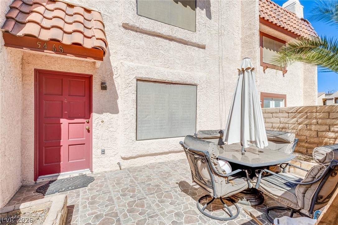 Countryard with tiled entry and gate