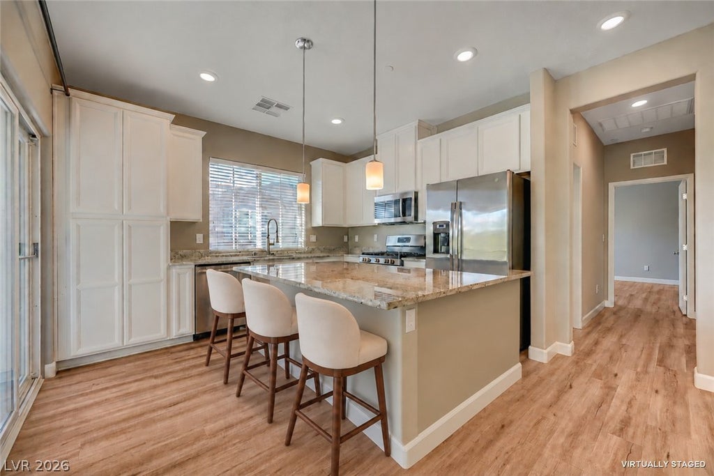 Photo of 8487 Insignia Avenue #106, Las Vegas, NV 89178 (MLS # 2827198)