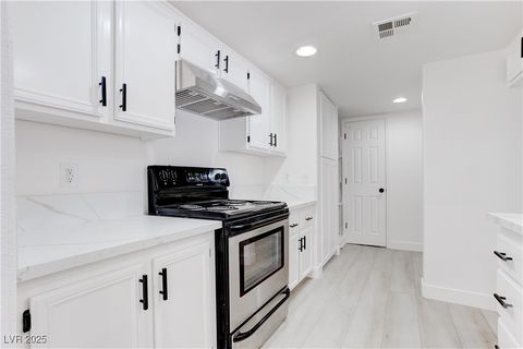 Photo of 5792 Ambassador Avenue #102, Las Vegas, NV 89122 (MLS # 2741018)