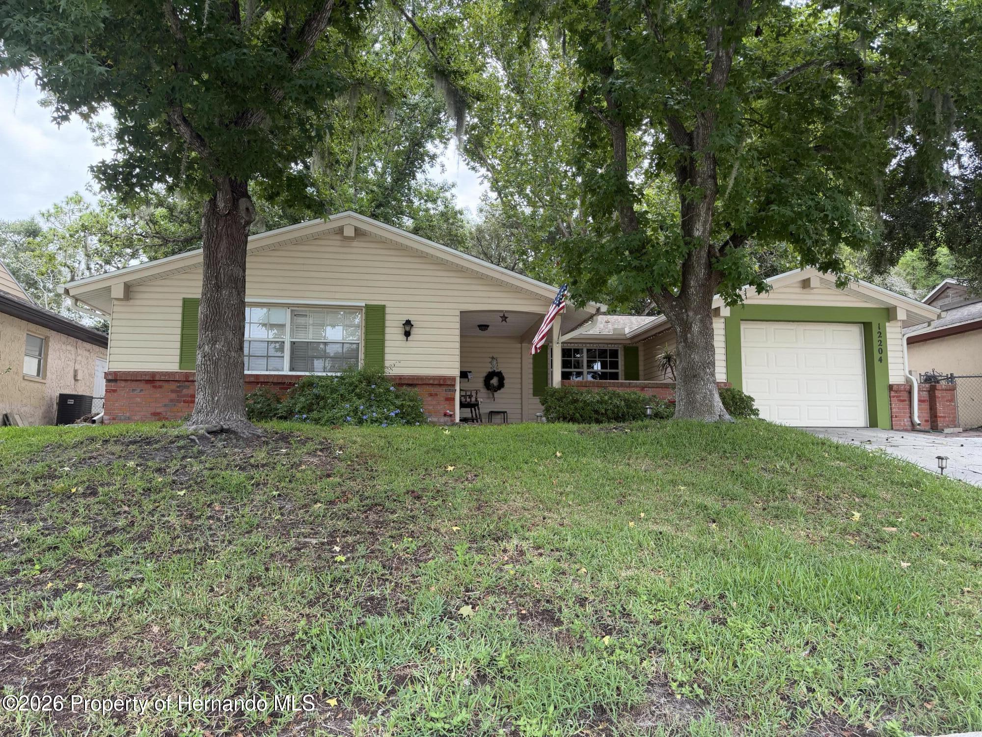 Photo 1 of 18 — 12204 Bear Creek Lane, Hudson, FL 34667