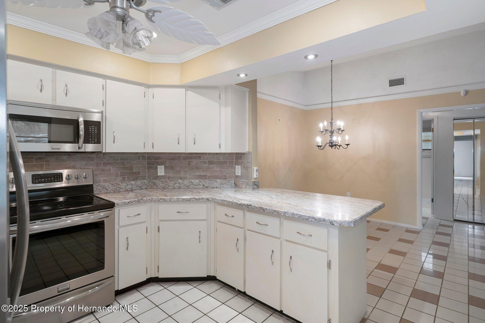 4000 Treetop Circle, Spring Hill, Florida image 15