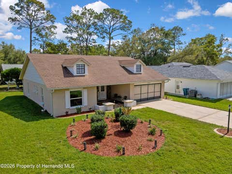 Homes For Sale - 6433 Lost Tree Lane<br/> Spring Hill, FL 34606