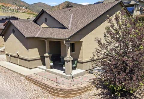 Photo of 5473 Lions Gate Lane, Colorado Springs, CO 80919 (MLS # 6294872)