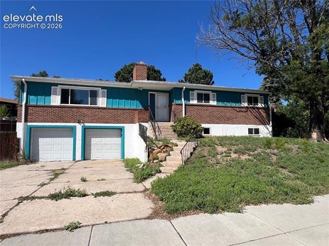 Photo of 2802 Flintridge Drive #T, Colorado Springs, CO 80918 (MLS # 9155013)
