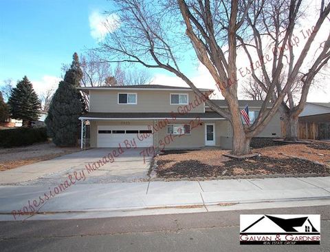 Photo of 2335 Zane Place, Colorado Springs, CO 80909 (MLS # R13340612)