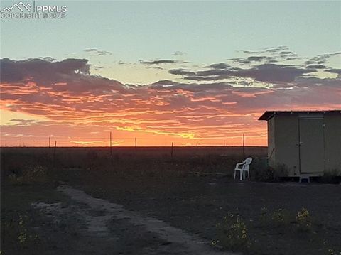 Photo of 12155 Oil Well Road, Calhan, CO 80808 (MLS # 5661236) Photo of 12155 Oil Well Road, Calhan, CO 80808 (MLS # 5661236)