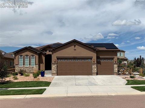 Photo of 7215 Rim Bluff Lane, Colorado Springs, CO 80927 (MLS # 2422715)