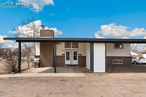 Photo of 1512 E Monument Street, Colorado Springs, CO 80909 (MLS # 2256084)