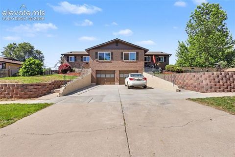 Photo of 2522 E Buena Ventura Street, Colorado Springs, CO 80909 (MLS # 6693995)