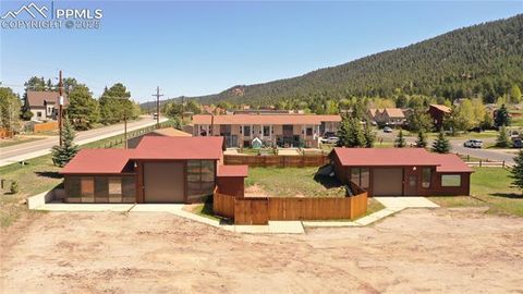 Photo of 500 Rampart Range Road, Woodland Park, CO 80863 (MLS # 9825190)
