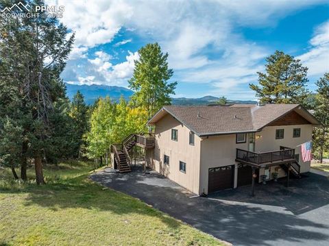 Photo of 1051 Forest Hill Road, Woodland Park, CO 80863 (MLS # 8451307)