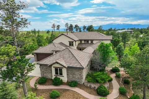 Photo of 5085 Saxton Hollow Road, Colorado Springs, CO 80908 (MLS # 4432983)