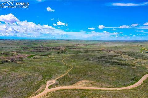 Photo of 21058 Way of Peace, Deer Trail, CO 80105 (MLS # 9504671) Photo of 21058 Way of Peace, Deer Trail, CO 80105 (MLS # 9504671)