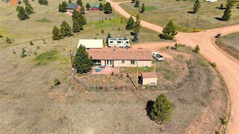 Photo of 891 S Mountain Estates Road, Florissant, CO 80816 (MLS # 3928177)