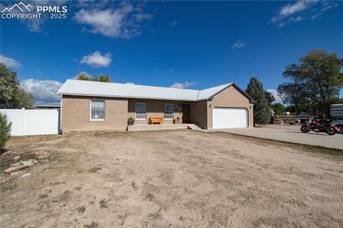 Photo of 1037 12th Street, Penrose, CO 81240 (MLS # 7661494) Photo of 1037 12th Street, Penrose, CO 81240 (MLS # 7661494)