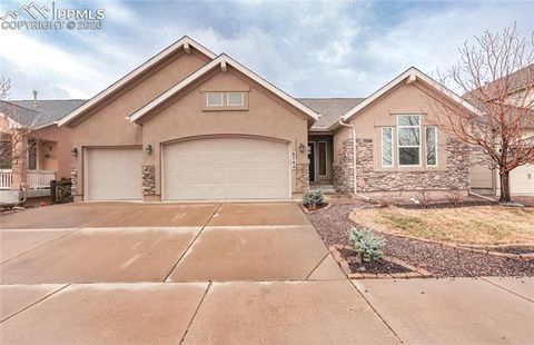 Photo of 8704 Meadow Tree Trail, Colorado Springs, CO 80927 (MLS # 7652559)