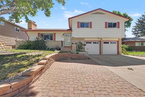 Photo of 1011 N Chelton Road, Colorado Springs, CO 80909 (MLS # 5154842)
