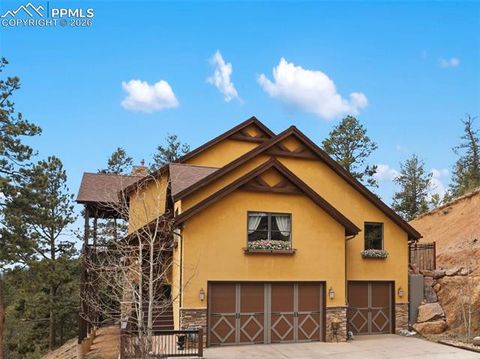 Photo of 12810 Rampart Range Road, Woodland Park, CO 80863 (MLS # 9476212)