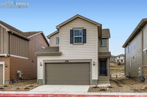 Photo of 1154 Smiley Creek Point, Colorado Springs, CO 80904 (MLS # 6125195)