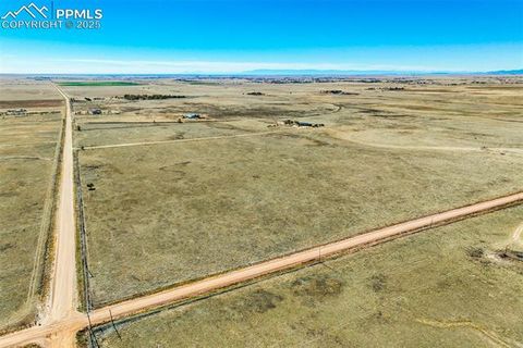 Photo of 1 N Baggett Road, Calhan, CO 80808 (MLS # 3508817) Photo of 1 N Baggett Road, Calhan, CO 80808 (MLS # 3508817)