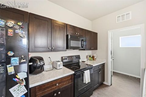 Tiny photo for 2004 Rozzer View, Colorado Springs, CO 80910 (MLS # 3832675)