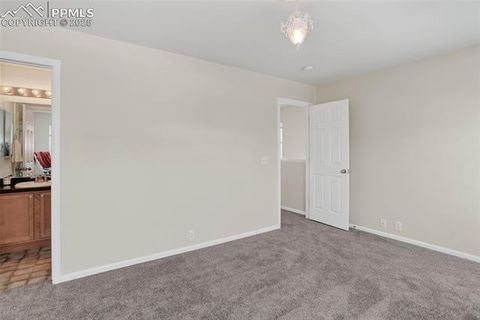 Tiny photo for 2199 Squawbush Ridge Grove, Colorado Springs, CO 80910 (MLS # 9617664)