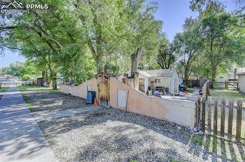 Photo of 519 Prairie Road, Colorado Springs, CO 80909 (MLS # 9639889)