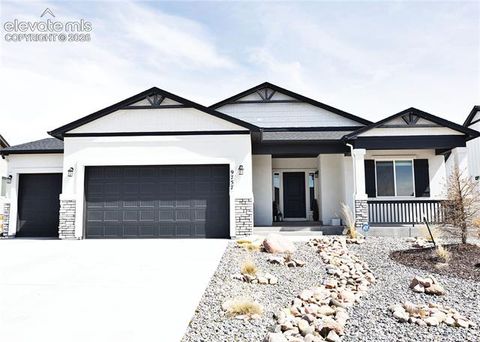 Photo of 9757 Bison Valley Trail, Colorado Springs, CO 80908 (MLS # 7628159)