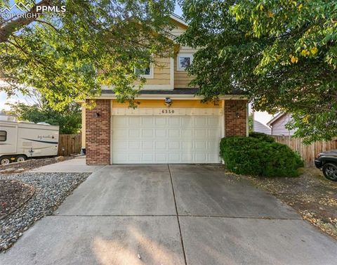 Photo of 6350 Naturita Trail, Colorado Springs, CO 80922 (MLS # 9861310) Photo of 6350 Naturita Trail, Colorado Springs, CO 80922 (MLS # 9861310)