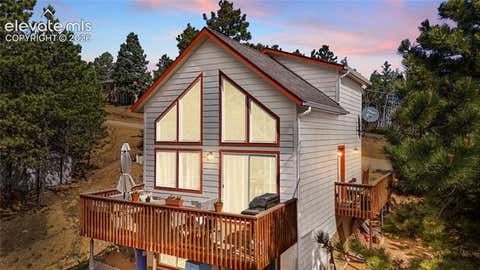 Photo of 318 Klitowya Trail, Woodland Park, CO 80863 (MLS # 2928659)