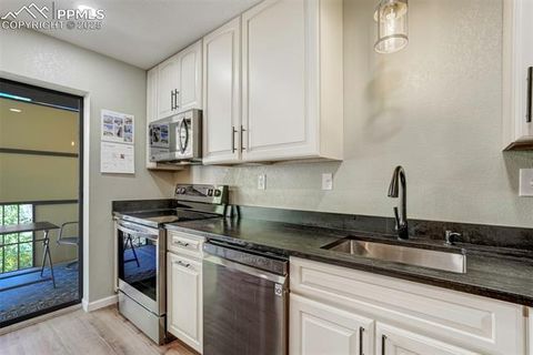 Tiny photo for 777 Saturn Drive #312, Colorado Springs, CO 80905 (MLS # 6149462)