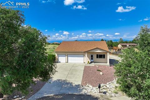 Photo of 921 S Cellini Lane, Pueblo West, CO 81007 (MLS # 5411232) Photo of 921 S Cellini Lane, Pueblo West, CO 81007 (MLS # 5411232)