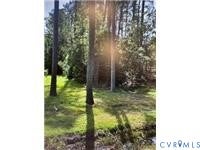 Photo of .880ac Lillys Neck Road, Moon, VA 23119 (MLS # 2623555)