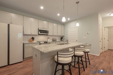 Photo of 12109 Oxford Landing Drive #104, Glen Allen, VA 23059 (MLS # 2530069)