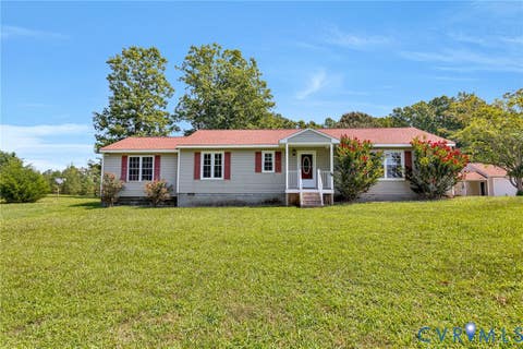 Photo of 257 Lumbee Indian Road, Millers Tavern, VA 23115 (MLS # 2622110)