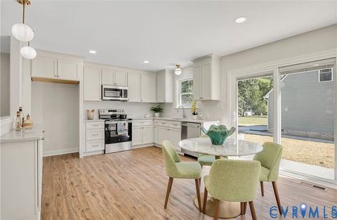 Photo of 14915 Lebanon Road, Spring Grove, VA 23111 (MLS # 2533211)