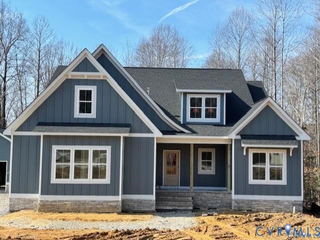 Modern farmhouse with board and batten siding, cov