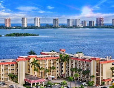 Photo of 100 Paradise Harbour 502 Boulevard #502, North Palm Beach, FL 33408 (MLS # RX-11122442)