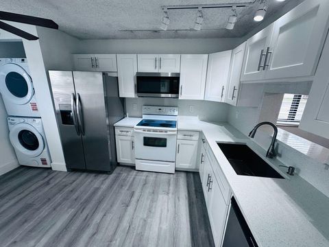 Photo of 7951 Southgate Boulevard #F1, North Lauderdale, FL 33068 (MLS # RX-11125470)