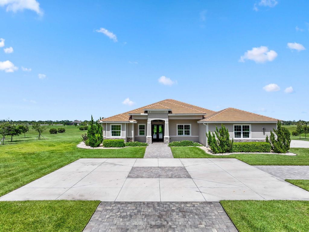 Photo of 5901 SW Saddlebrook Lane, Palm City, FL 34990 (MLS # RX-11104743)