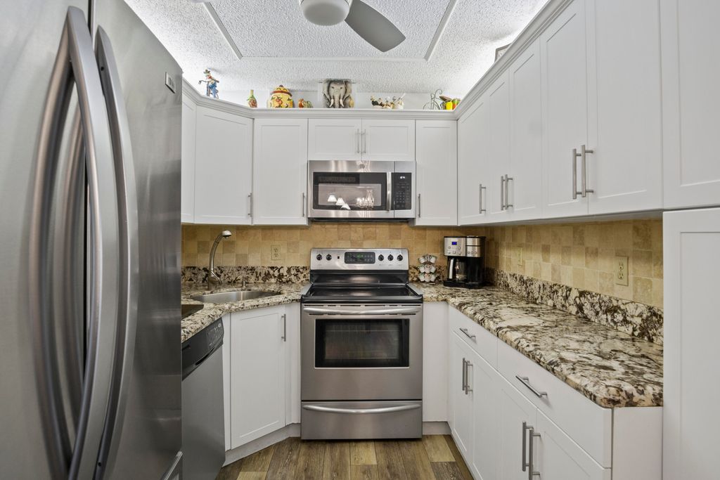 Photo of 1995 SW Silver Pine Way #119-D2, Palm City, FL 34990 (MLS # RX-11061662)