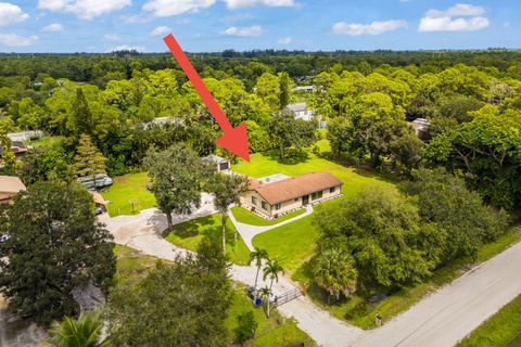 Photo of 12859 54th Street N, West Palm Beach, FL 33411 (MLS # RX-11126200)