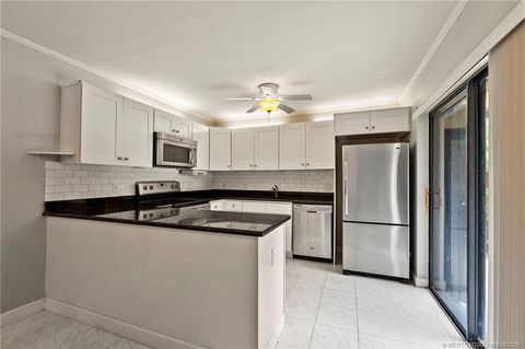 Photo of 6143 SE Windsong Lane #1025, Stuart, FL 34997 (MLS # RX-11127371)