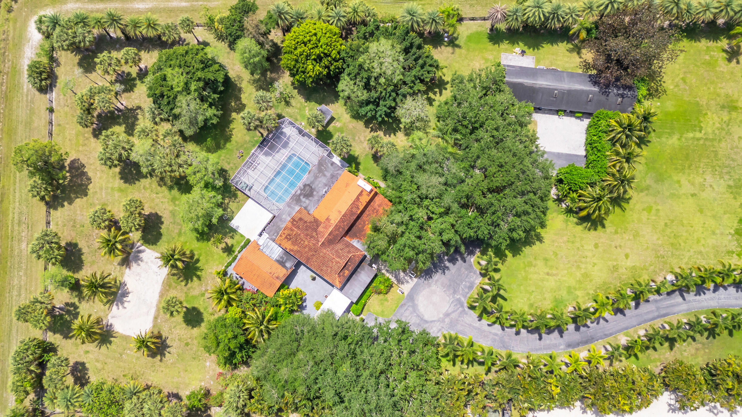 1030 Arabian Drive, Loxahatchee, Palm Beach County, Florida - 4 Bedrooms  
4.5 Bathrooms - 