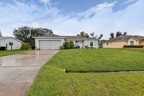 Photo of 251 NW Lincoln Avenue, Port Saint Lucie, FL 34983 (MLS # RX-11129467)