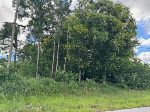 Photo of 6413 NW Regal Circle, Fort Pierce, FL 34983 (MLS # RX-11127109)