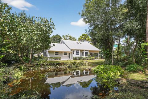 Photo of 556 SE Meadow Wood Way, Stuart, FL 34997 (MLS # RX-11125915)